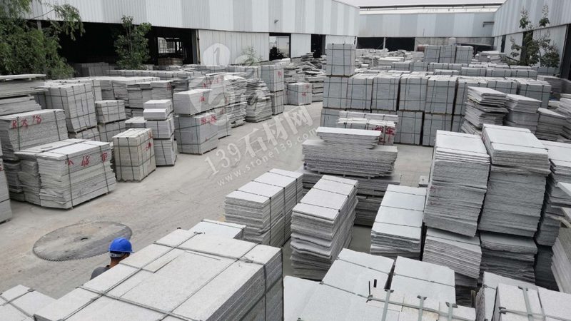 石材批发市场人造石材：揭秘其与天然石材的较量